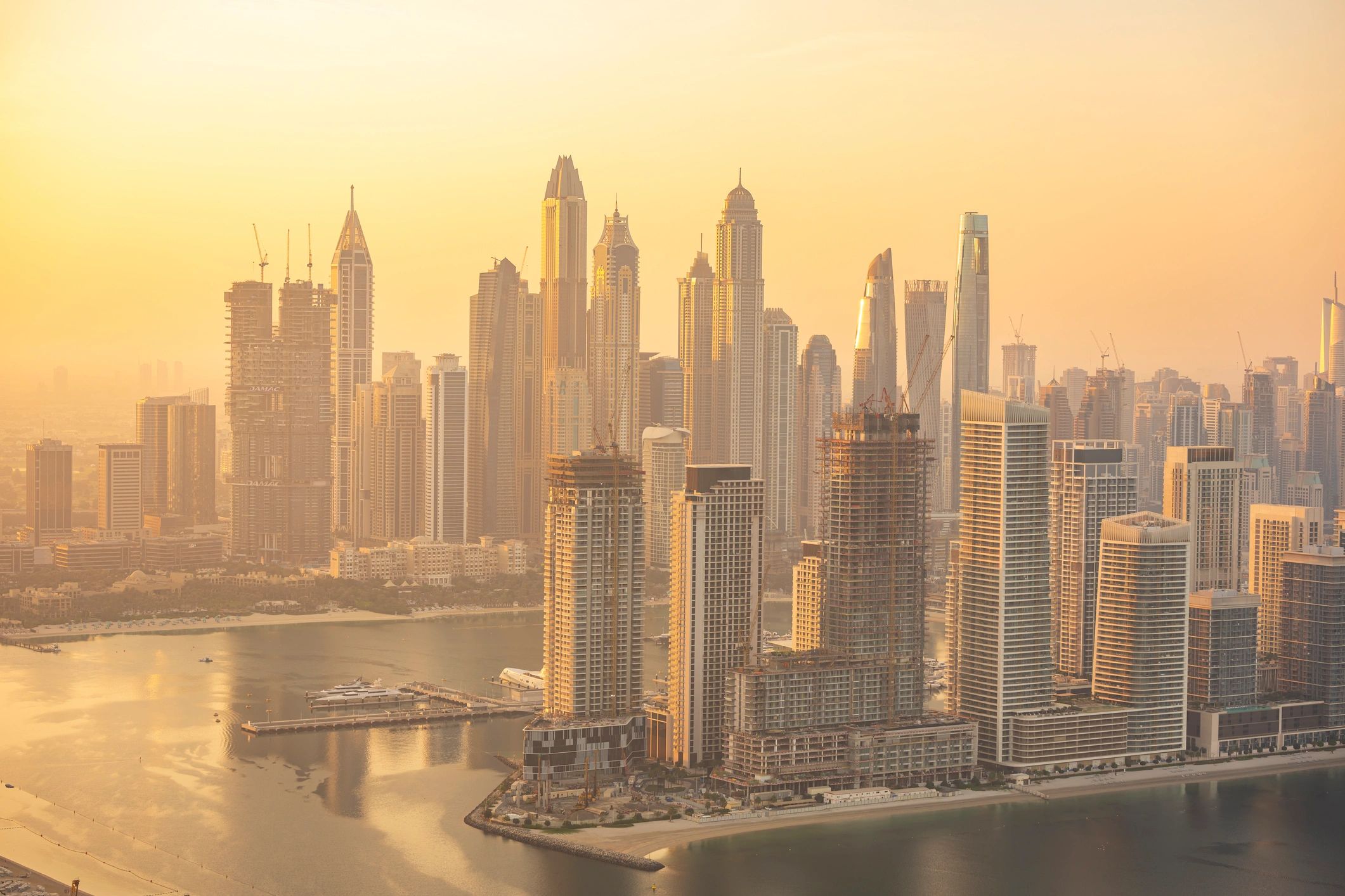 Modern Middle East skyline at sunset